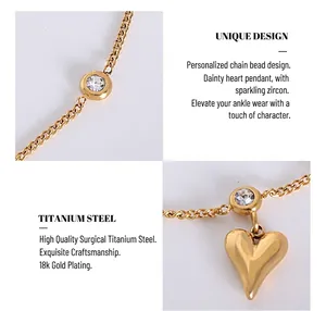 Detail of 18k gold plated titanium anklet with zircon stones and a heart charm