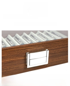 Detail of rust-resistant silver metal latch on premium wood grain watch and pen storage box