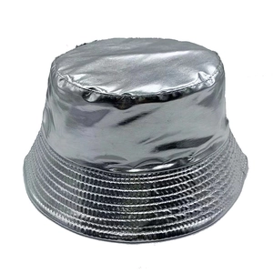 Detail of silver metallic bucket hat showing shiny reflective coating and stitched brim