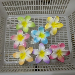 Bulk set of colorful gradient Plumeria hair claws in green, yellow, pink and purple tones