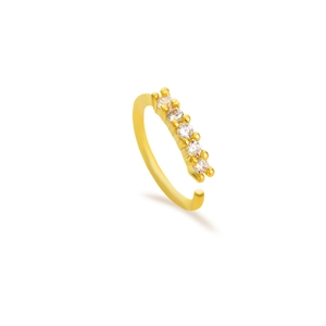 Close-up of golden nose ring featuring six sparkling white cubic zirconia leaf-shaped stones
