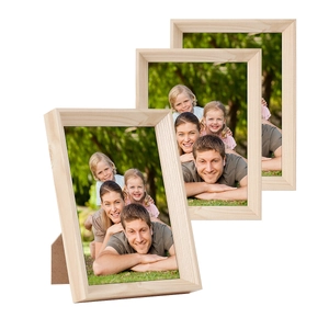 Set of three vintage solid wood picture frames with natural grain for home decor display