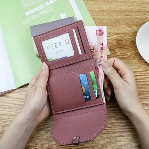 Three-fold leather wallet for women in dusty pink with multiple card slots and cash pocket