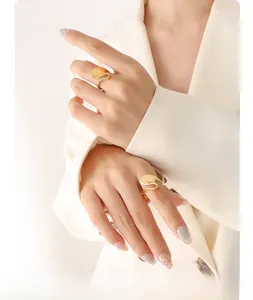 Set of two gold irregular geometric rings with a modern minimalist streamlined design
