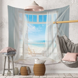 Detail showing high-definition beach view tapestry hanging on a textured white wall