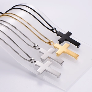 Minimalist stainless steel cross pendant necklaces in black, gold, and silver finishes