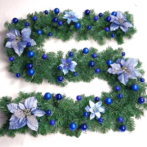 Detail of 2.7m Christmas garland featuring blue ornaments and festive pine needles