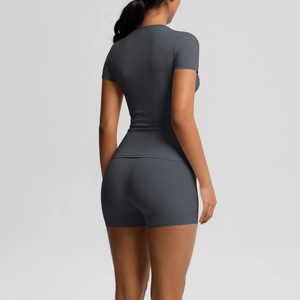 Rear view of dark grey slim-fit yoga set showing high-elasticity breathable fabric