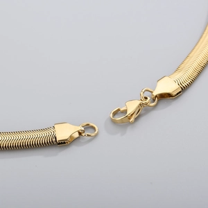 Gold flat herringbone snake chain necklace in durable titanium steel with lobster clasp