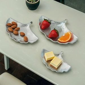 Elegant silver ginkgo leaf metal trays with realistic vein textures for home decor