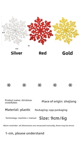 Detailed view of 9cm plastic Christmas snowflakes in gold, silver, and red finishes