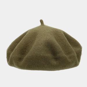 Close-up of olive green wool felt beret showing premium texture and classic french style