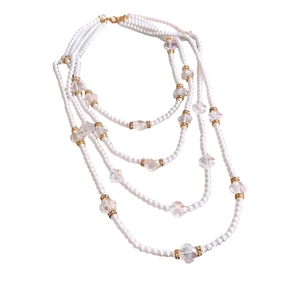 Elegant four-layer pearl flower necklace with gold lobster clasp and extension chain