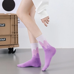 Gradient purple mid-calf knitted socks featuring a creative white wave color-block design