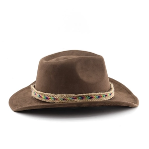 Detail of a brown suede cowboy hat featuring an ethnic rainbow braided hemp rope band
