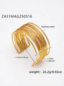 Macro shot of gold wide multi-layer stainless steel open cuff bracelet with dimensions