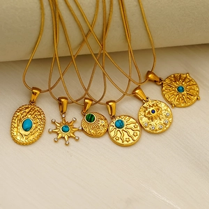 Bohemian gold plated evil eye necklace set with turquoise and malachite stones