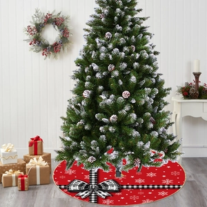Red Christmas tree skirt with white snowflake print and black-white plaid bow decoration