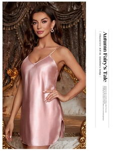 Close-up of pink satin nightgown with V-neckline and delicate silk finish texture