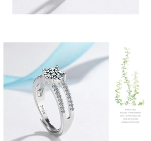 Macro shot of silver ring with S925 engraving and delicate sparkling cubic zirconia stones