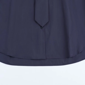 Navy blue poplin shirt for women featuring a stylish tie detail and curved hemline