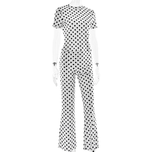 Vue détaillée de l'ensemble haut à manches courtes et pantalon évasé à pois noir et blanc