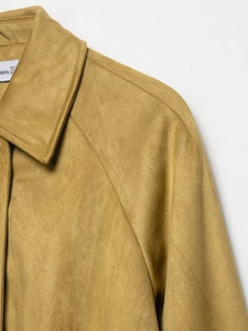 Macro detail of the lapel and stitching on this camel faux suede bomber jacket
