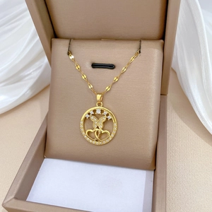 Luxurious gold titanium necklace with butterfly heart pendant in a premium jewelry box