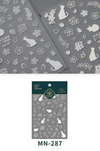 Macro view of MN-287 nail stickers with embossed cat and cherry blossom patterns