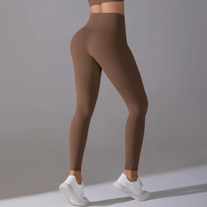Back view of high waist coffee brown yoga leggings showing seamless push up effect