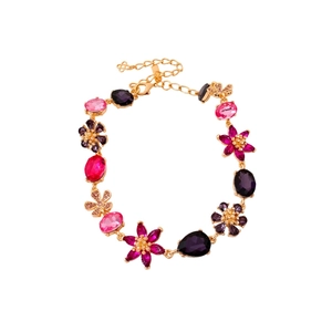 Vintage style floral crystal necklace in pink and purple colors on a white background