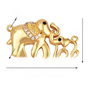 Detail of gold-plated elephant connector with white crystals and dimension text