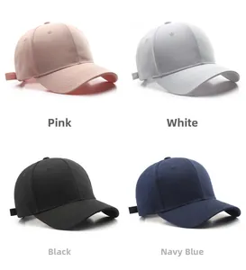 Detail view of cotton baseball caps in pink, light grey, black and navy blue options