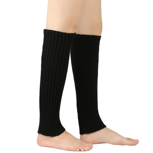 Detailed close-up of black ribbed knit leg warmers showing high-elastic texture