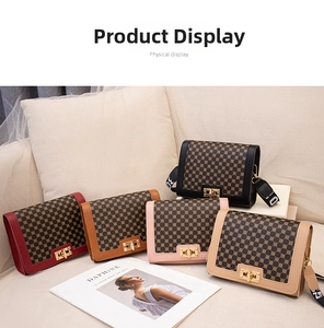 Detail of five crossbody bags featuring monogram pattern and gold swivel locks