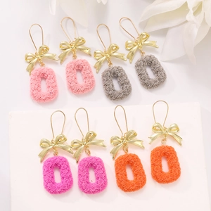 Bow knot earrings with rose carved floral oval pendants in four assorted vibrant colors