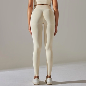 Rear view of cream seamless yoga set showing high-waist ribbing and butt-lifting texture
