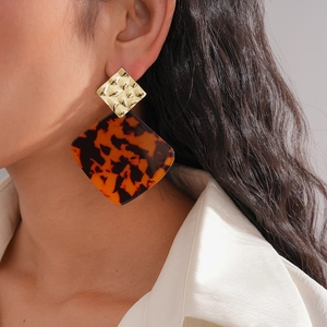 Fashion acrylic earrings with gold hammered diamond metal piece and tortoise shell pendants
