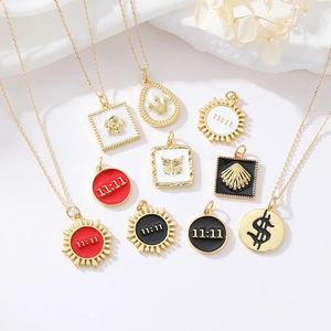 9-piece set of 14k gold plated enamel pendants featuring 11:11 and dollar sign motifs