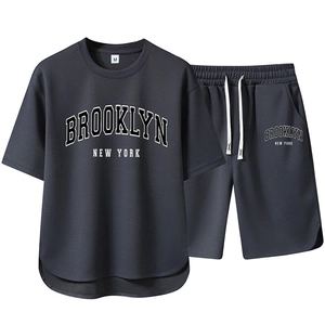 Detail of Brooklyn print on dark grey breathable knit t-shirt and shorts set