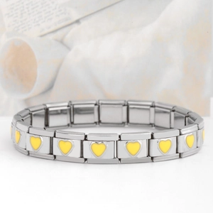 Detailed macro view of Italian modular stainless steel bracelet with yellow enamel hearts