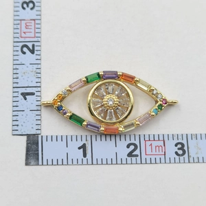 Detailed scale measurement of gold plated evil eye pendant with colorful zircon stones