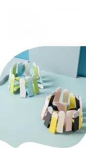 Detail view of colorful iron cat bowl stands with anti-slip silicone protective sleeves