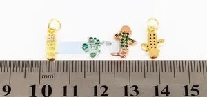 Macro view of micro-pave cactus charms with a ruler showing 15mm height detail
