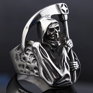Macro detail of gothic Grim Reaper scythe ring with vintage silver distressed finish