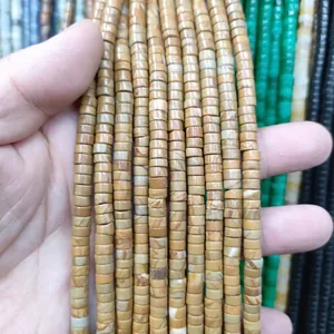 Macro detail of natural stone spacer beads for DIY jewelry making in various earthy tones