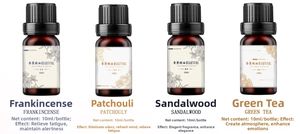 Set of four 10ml essential oils including Frankincense, Sandalwood and Green Tea scents