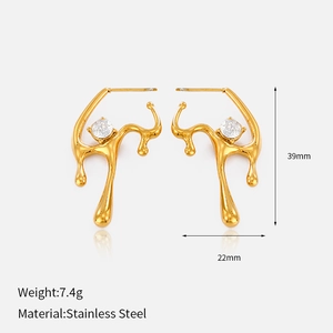 Detail of 18K gold plated stainless steel lava earrings with sparkling zircon inlay