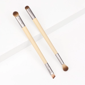 Dual-ended eyeshadow and eyebrow brushes with natural wood handles and metal ferrules