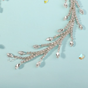 Exquisite bridal forehead chain with silver crystal vine leaves for wedding hair styling